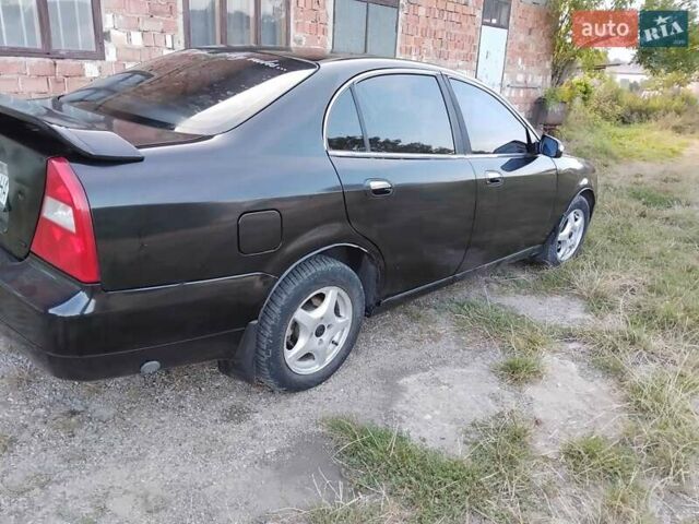 Черный Чери Истар, объемом двигателя 2 л и пробегом 350 тыс. км за 2100 $, фото 5 на Automoto.ua