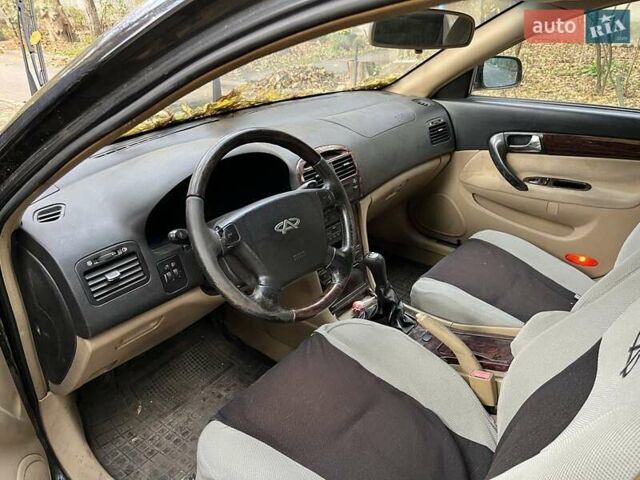 Чорний Чері Істар, об'ємом двигуна 2 л та пробігом 123 тис. км за 2700 $, фото 11 на Automoto.ua