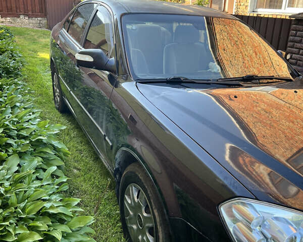 Черный Чери Истар, объемом двигателя 1.97 л и пробегом 259 тыс. км за 2499 $, фото 2 на Automoto.ua