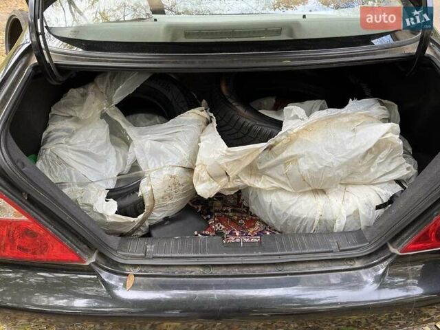 Чорний Чері Істар, об'ємом двигуна 2 л та пробігом 123 тис. км за 2700 $, фото 1 на Automoto.ua