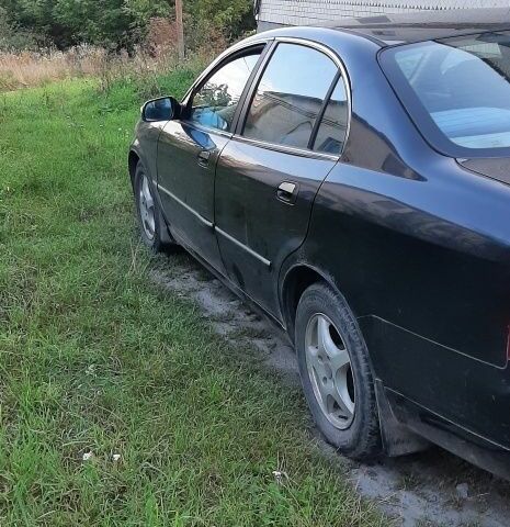 Черный Чери Истар, объемом двигателя 2 л и пробегом 129 тыс. км за 1500 $, фото 1 на Automoto.ua