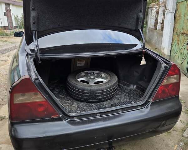 Черный Чери Истар, объемом двигателя 1.97 л и пробегом 290 тыс. км за 2450 $, фото 5 на Automoto.ua