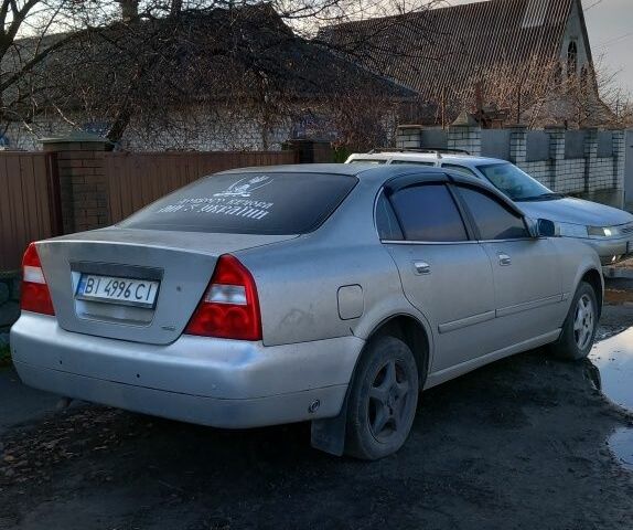 Серый Чери Истар, объемом двигателя 2 л и пробегом 238 тыс. км за 1531 $, фото 2 на Automoto.ua