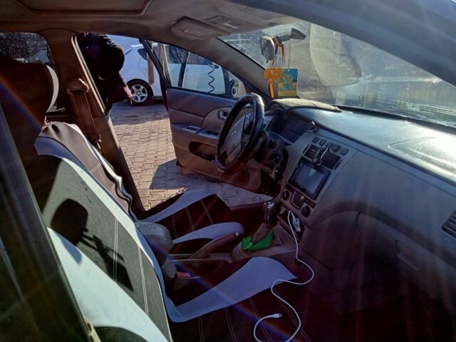 Черный Чери Элара, объемом двигателя 2 л и пробегом 98 тыс. км за 1900 $, фото 8 на Automoto.ua