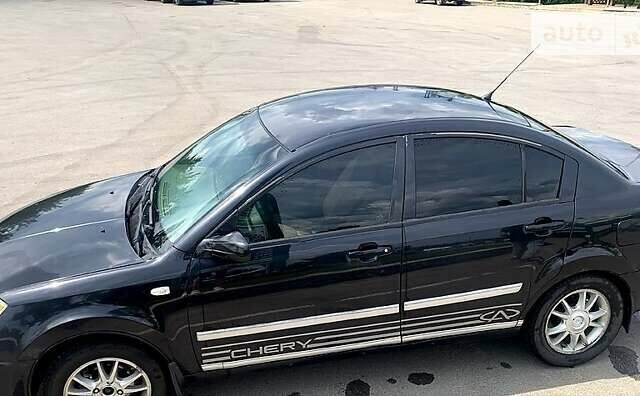 Черный Чери Элара, объемом двигателя 2 л и пробегом 210 тыс. км за 2900 $, фото 3 на Automoto.ua
