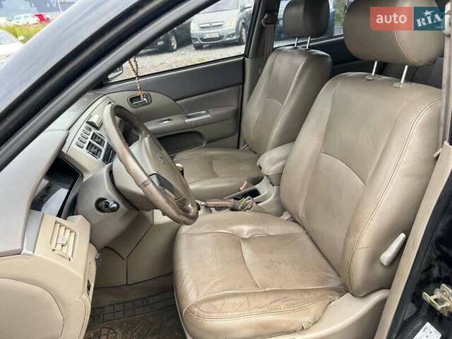 Черный Чери Элара, объемом двигателя 2 л и пробегом 172 тыс. км за 2990 $, фото 17 на Automoto.ua