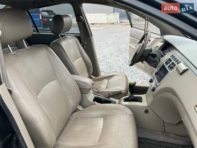 Черный Чери Элара, объемом двигателя 2 л и пробегом 172 тыс. км за 2990 $, фото 30 на Automoto.ua