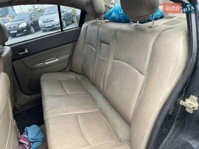 Черный Чери Элара, объемом двигателя 2 л и пробегом 172 тыс. км за 2990 $, фото 29 на Automoto.ua