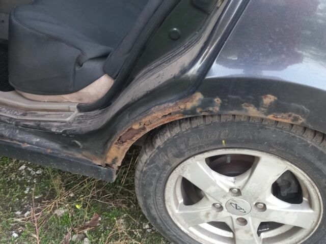 Черный Чери Элара, объемом двигателя 2 л и пробегом 213 тыс. км за 1500 $, фото 3 на Automoto.ua