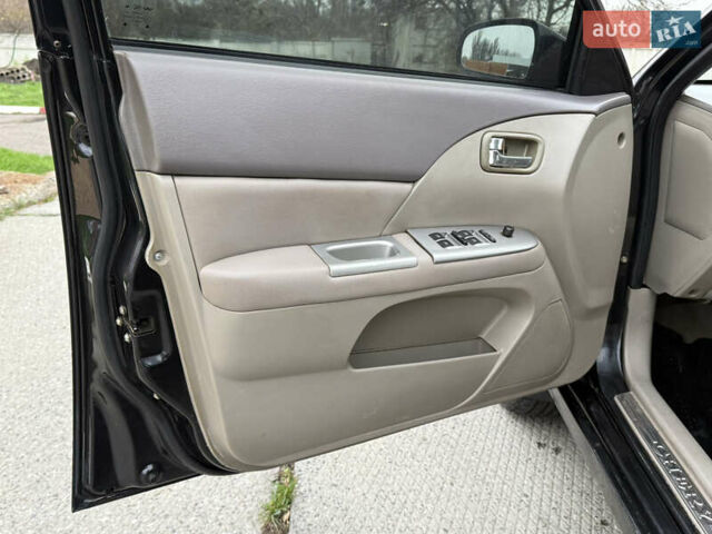 Чорний Чері Елара, об'ємом двигуна 1.97 л та пробігом 185 тис. км за 1950 $, фото 8 на Automoto.ua