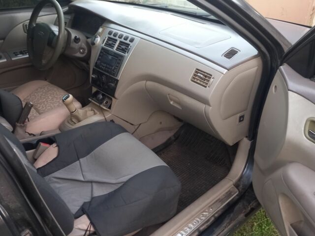 Черный Чери Элара, объемом двигателя 2 л и пробегом 213 тыс. км за 1500 $, фото 7 на Automoto.ua