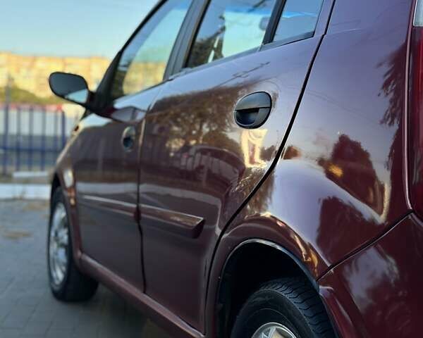 Червоний Чері Кімо, об'ємом двигуна 1.3 л та пробігом 142 тис. км за 1950 $, фото 6 на Automoto.ua