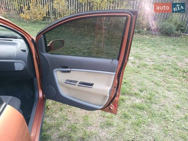 Оранжевый Чери Кимо, объемом двигателя 1.3 л и пробегом 143 тыс. км за 3200 $, фото 10 на Automoto.ua