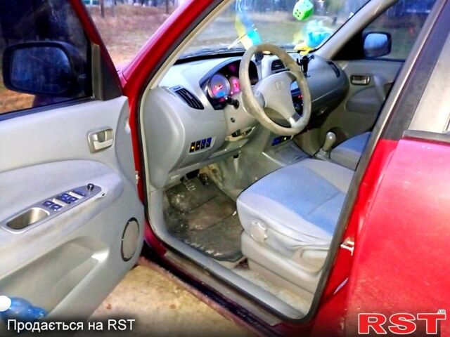 Красный Чери Tiggo 2, объемом двигателя 2 л и пробегом 247 тыс. км за 3500 $, фото 5 на Automoto.ua