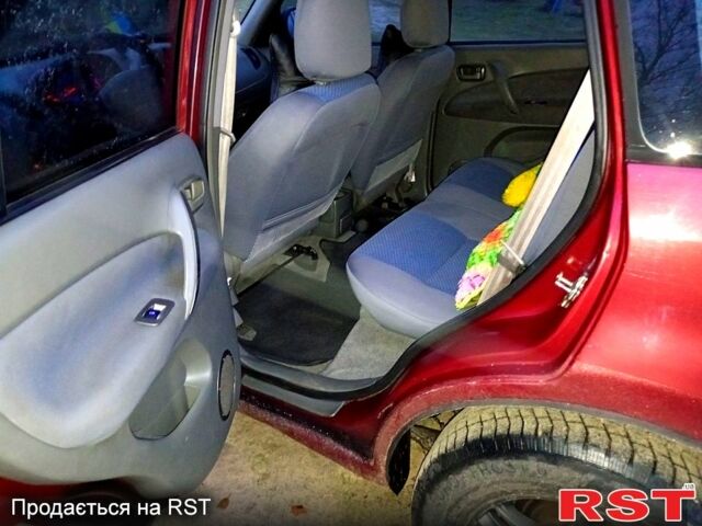 Красный Чери Tiggo 2, объемом двигателя 2 л и пробегом 247 тыс. км за 3500 $, фото 6 на Automoto.ua