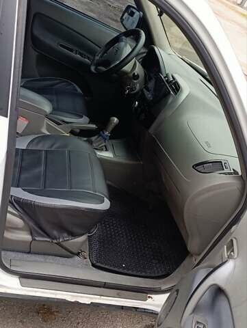 Белый Чери Тигго, объемом двигателя 2 л и пробегом 275 тыс. км за 2700 $, фото 11 на Automoto.ua