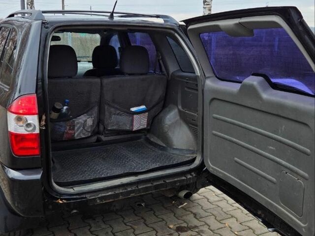 Черный Чери Тигго, объемом двигателя 2 л и пробегом 220 тыс. км за 3000 $, фото 1 на Automoto.ua