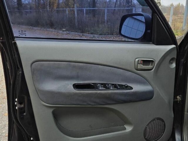 Черный Чери Тигго, объемом двигателя 2 л и пробегом 220 тыс. км за 3000 $, фото 14 на Automoto.ua