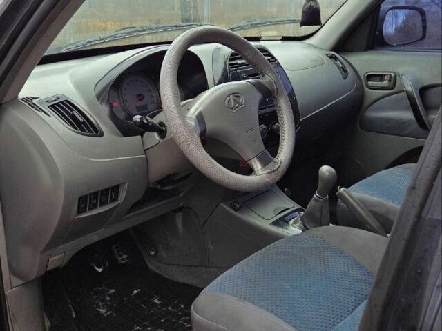 Черный Чери Тигго, объемом двигателя 2 л и пробегом 220 тыс. км за 3000 $, фото 7 на Automoto.ua