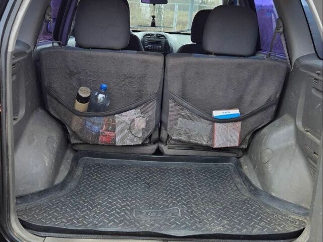 Черный Чери Тигго, объемом двигателя 2 л и пробегом 220 тыс. км за 3000 $, фото 2 на Automoto.ua