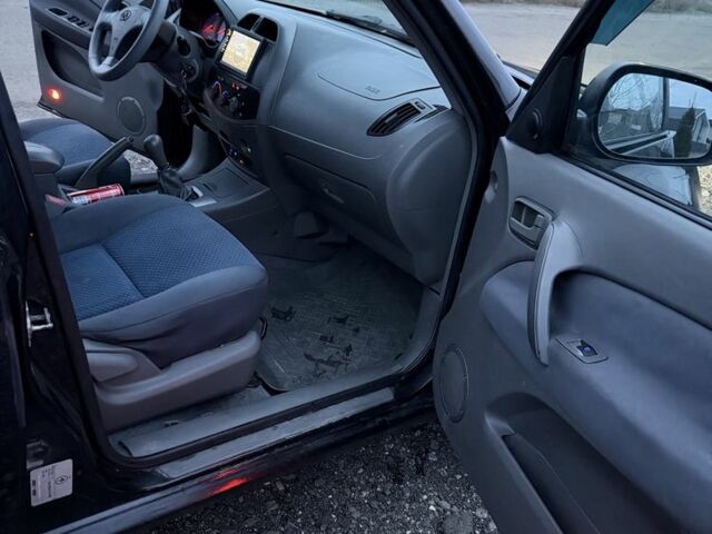 Черный Чери Тигго, объемом двигателя 2 л и пробегом 259 тыс. км за 3349 $, фото 17 на Automoto.ua