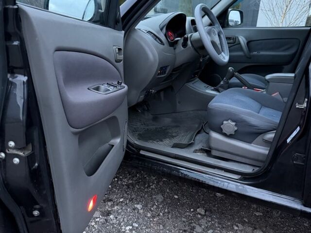 Черный Чери Тигго, объемом двигателя 2 л и пробегом 259 тыс. км за 3349 $, фото 7 на Automoto.ua