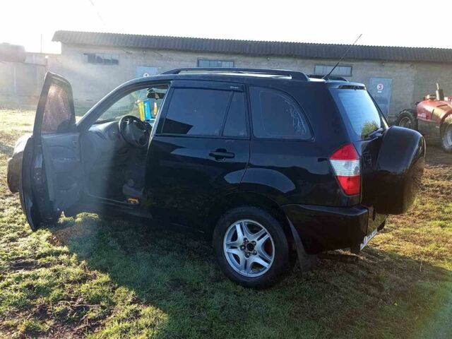 Черный Чери Тигго, объемом двигателя 2 л и пробегом 194 тыс. км за 2610 $, фото 1 на Automoto.ua