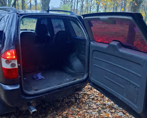 Чорний Чері Тігго, об'ємом двигуна 2 л та пробігом 240 тис. км за 3500 $, фото 4 на Automoto.ua