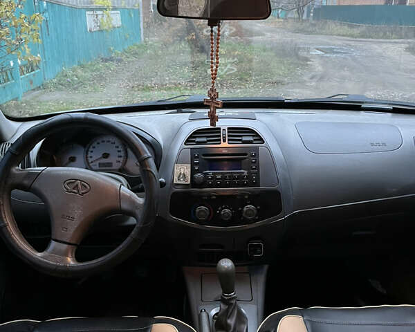 Черный Чери Тигго, объемом двигателя 2 л и пробегом 150 тыс. км за 3500 $, фото 7 на Automoto.ua