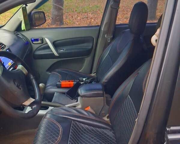 Черный Чери Тигго, объемом двигателя 2 л и пробегом 240 тыс. км за 3500 $, фото 8 на Automoto.ua