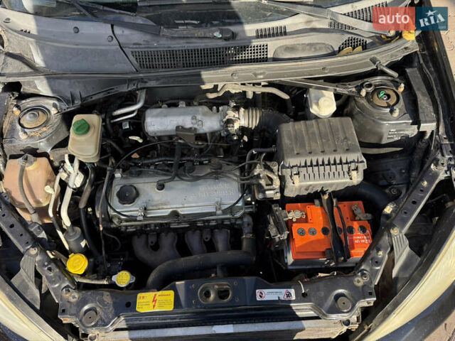 Черный Чери Тигго, объемом двигателя 2.4 л и пробегом 333 тыс. км за 3000 $, фото 8 на Automoto.ua