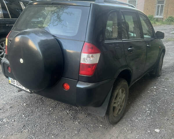 Черный Чери Тигго, объемом двигателя 2 л и пробегом 270 тыс. км за 2500 $, фото 1 на Automoto.ua