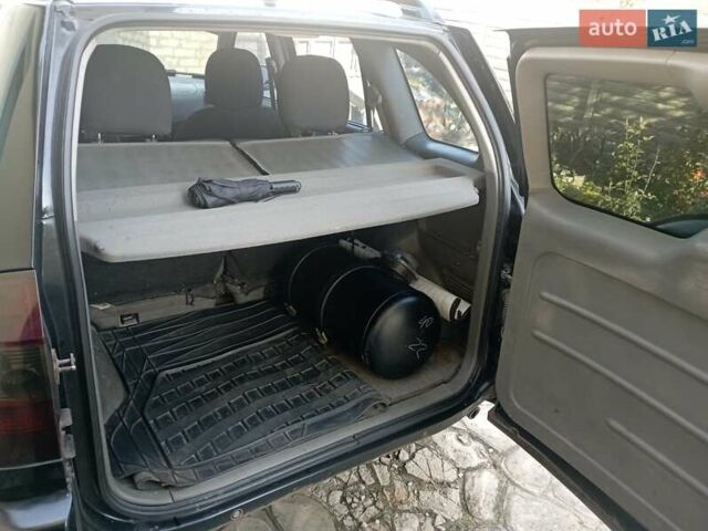 Чорний Чері Тігго, об'ємом двигуна 2 л та пробігом 169 тис. км за 4200 $, фото 6 на Automoto.ua