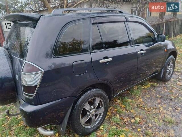 Черный Чери Тигго, объемом двигателя 2 л и пробегом 259 тыс. км за 4200 $, фото 8 на Automoto.ua