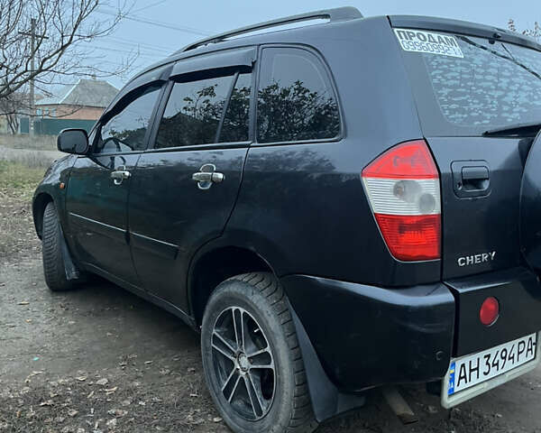Черный Чери Тигго, объемом двигателя 2 л и пробегом 150 тыс. км за 3500 $, фото 3 на Automoto.ua