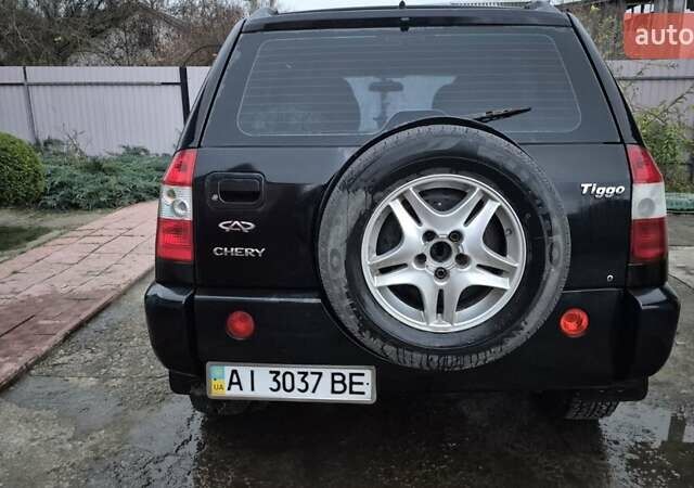 Чорний Чері Тігго, об'ємом двигуна 2 л та пробігом 239 тис. км за 3400 $, фото 6 на Automoto.ua