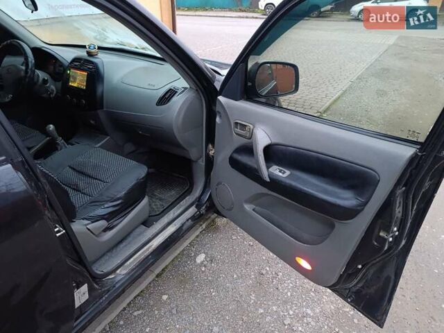 Чорний Чері Тігго, об'ємом двигуна 2 л та пробігом 231 тис. км за 2100 $, фото 27 на Automoto.ua