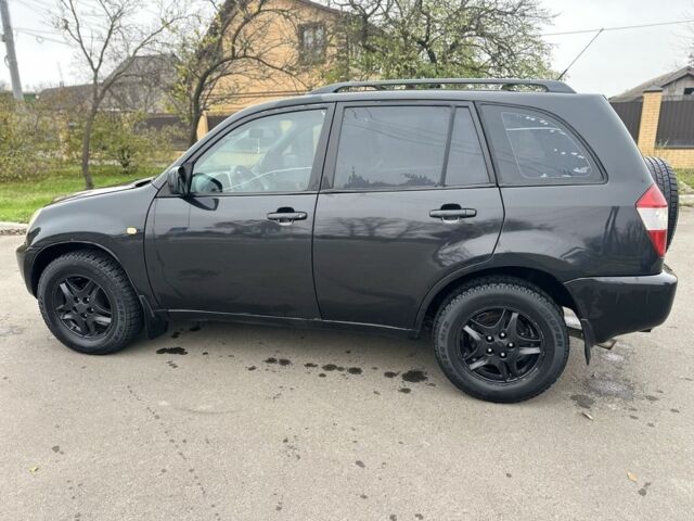 Чорний Чері Тігго, об'ємом двигуна 2 л та пробігом 200 тис. км за 3100 $, фото 4 на Automoto.ua