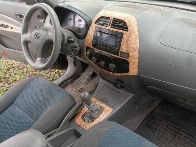 Черный Чери Тигго, объемом двигателя 2 л и пробегом 3 тыс. км за 2982 $, фото 2 на Automoto.ua