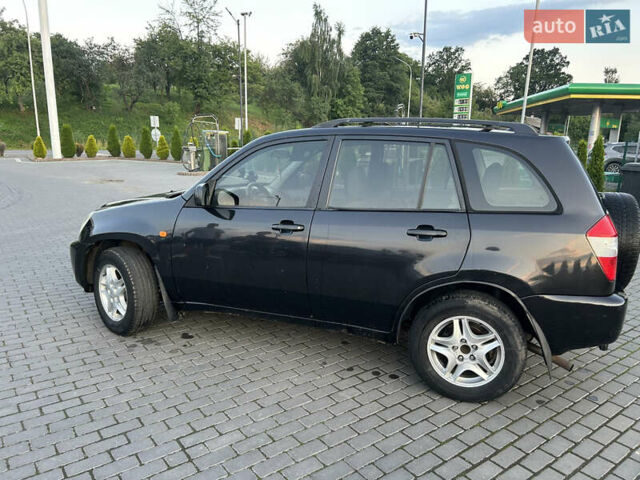 Чорний Чері Тігго, об'ємом двигуна 2 л та пробігом 258 тис. км за 3500 $, фото 5 на Automoto.ua