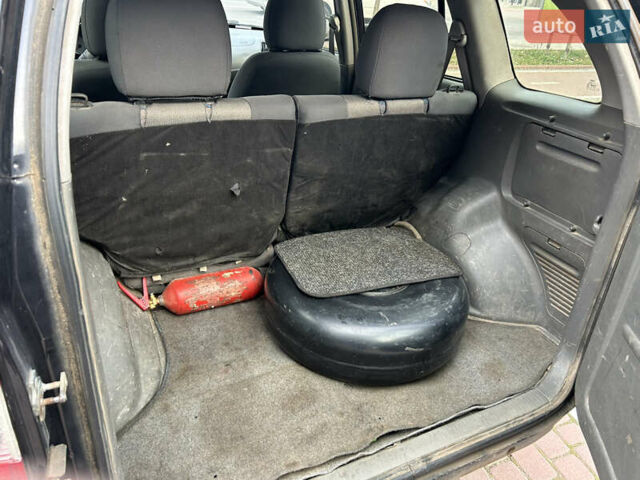 Чорний Чері Тігго, об'ємом двигуна 2 л та пробігом 258 тис. км за 3500 $, фото 7 на Automoto.ua