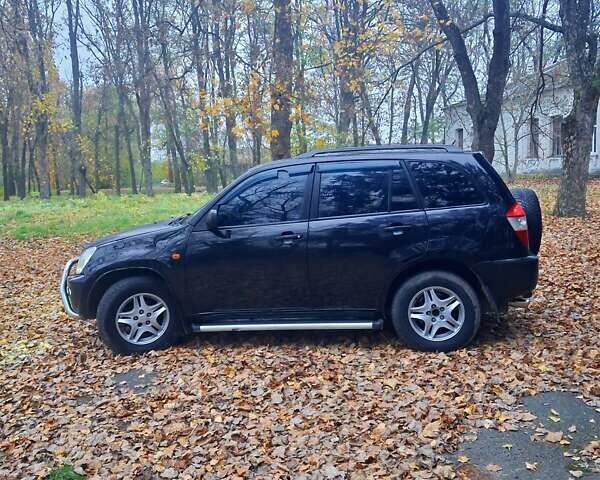 Черный Чери Тигго, объемом двигателя 2 л и пробегом 240 тыс. км за 3500 $, фото 4 на Automoto.ua