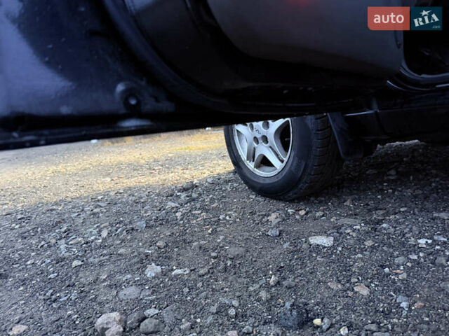 Черный Чери Тигго, объемом двигателя 2 л и пробегом 259 тыс. км за 3350 $, фото 13 на Automoto.ua