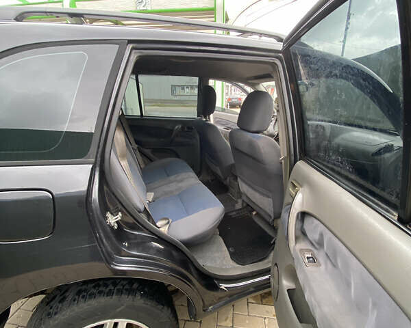 Чорний Чері Тігго, об'ємом двигуна 2 л та пробігом 147 тис. км за 3400 $, фото 20 на Automoto.ua