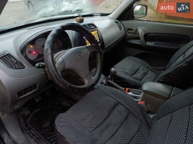 Чорний Чері Тігго, об'ємом двигуна 2 л та пробігом 231 тис. км за 2100 $, фото 29 на Automoto.ua