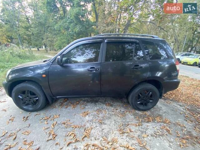 Чорний Чері Тігго, об'ємом двигуна 2 л та пробігом 228 тис. км за 4000 $, фото 5 на Automoto.ua