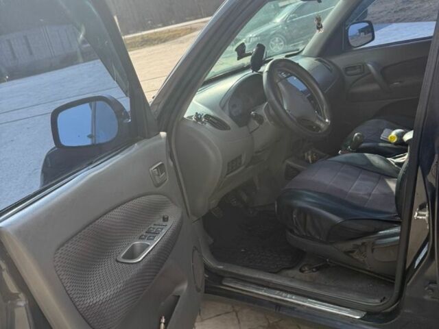 Чорний Чері Тігго, об'ємом двигуна 2 л та пробігом 300 тис. км за 2000 $, фото 10 на Automoto.ua