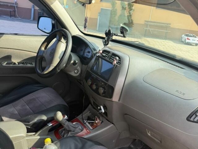 Чорний Чері Тігго, об'ємом двигуна 2 л та пробігом 300 тис. км за 2000 $, фото 6 на Automoto.ua