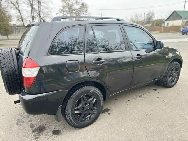 Чорний Чері Тігго, об'ємом двигуна 2 л та пробігом 200 тис. км за 3100 $, фото 2 на Automoto.ua