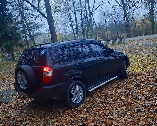 Черный Чери Тигго, объемом двигателя 2 л и пробегом 240 тыс. км за 3500 $, фото 6 на Automoto.ua